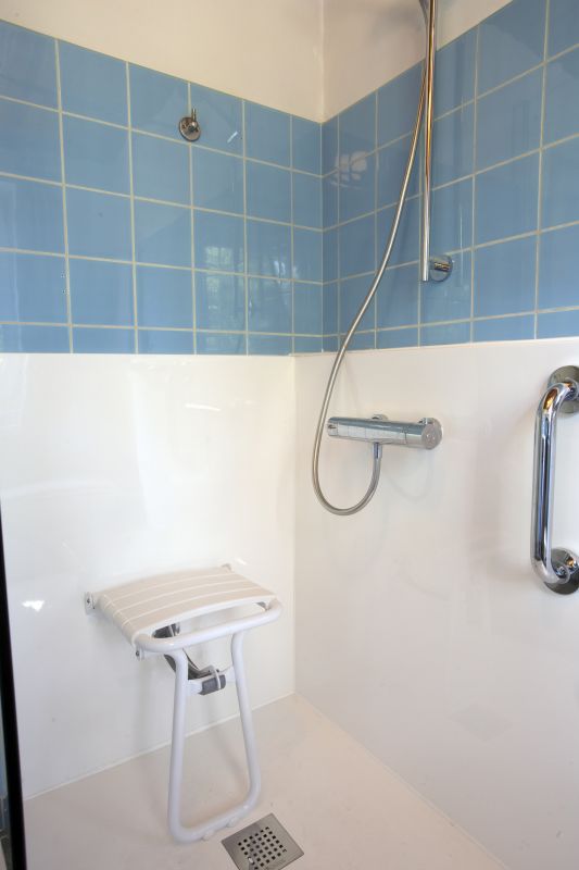Compact Shower with Folding Seat